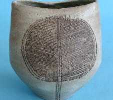 Oval pot with incised design